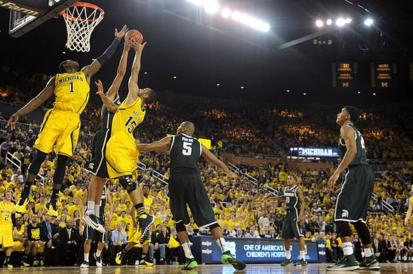 Glenn Robinson III (1) and Jon Horford (15)