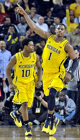 Derrick Walton Jr. (10) and Glenn Robinson III (1)