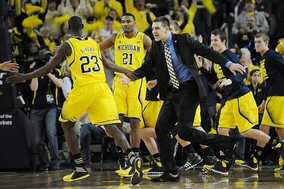 Caris LeVert (23), Zak Irvin (21), Mitch McGary (4), Andrew Dakich (5), and Brad Anlauf (14)