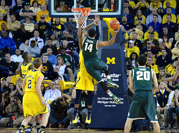 Spike Albrecht (2) and Caris LeVert (23)
