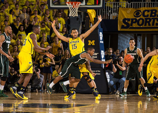 Caris LeVert (23) and Jon Horford (15)