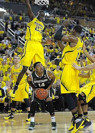 Nik Stauskas (11), Caris LeVert (23), Glenn Robinson III (1), and Jon Horford (15)