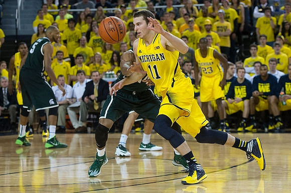 Nik Stauskas (11) and Caris LeVert (23)