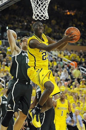 Caris LeVert (23) and Glenn Robinson III (1)