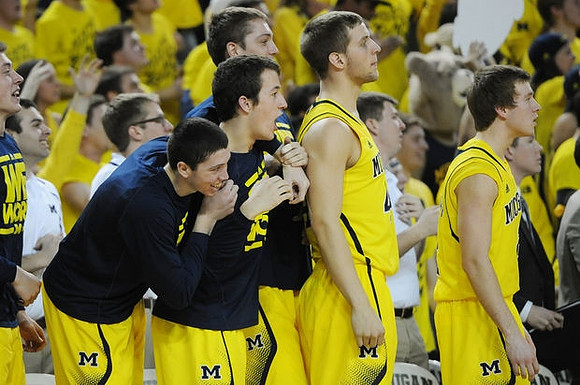 Sean Lonergan (20), Andrew Dakich (5), Mark Donnal (34), Max Bielfeldt (44), and Spike Albrecht (2)