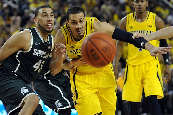 Jordan Morgan (52) and Glenn Robinson III (1)