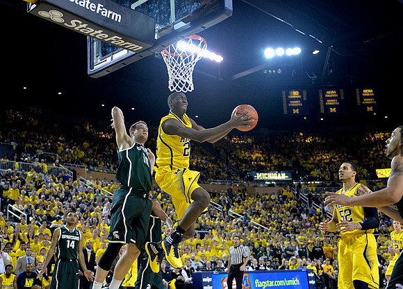 Caris LeVert (23) and Jordan Morgan (52)