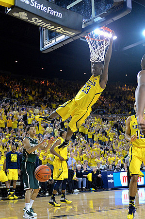 Caris LeVert (23) and Jon Horford (15)