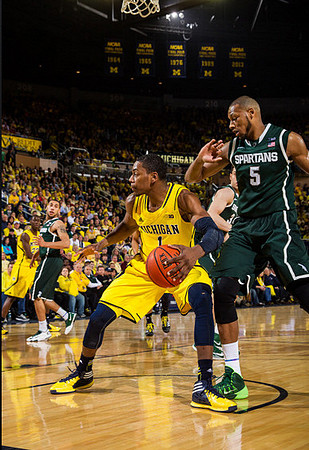 Caris LeVert (23) and Glenn Robinson III (1)
