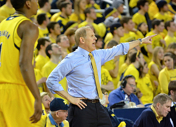 Glenn Robinson III (1) and John Beilein