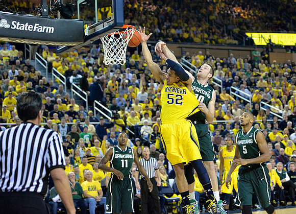 Jordan Morgan (52) and Glenn Robinson III (1)