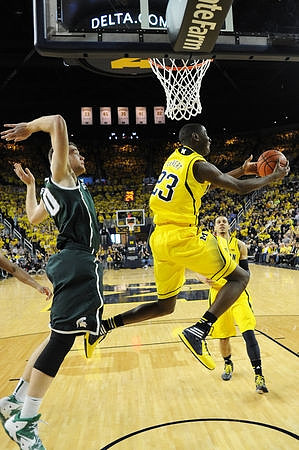Caris LeVert (23) and Jordan Morgan (52)
