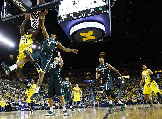 Caris LeVert (23), Glenn Robinson III (1), Nik Stauskas (11), and Jordan Morgan (52)