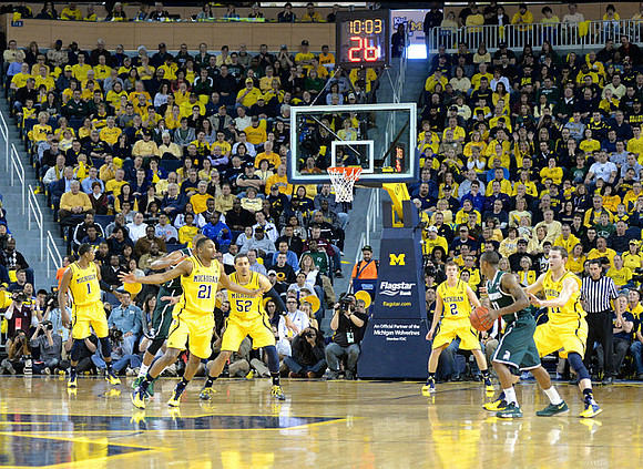 Glenn Robinson III (1), Zak Irvin (21), Jordan Morgan (52), Spike Albrecht (2), and Nik Stauskas (11)