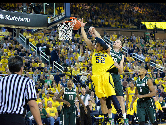 Jordan Morgan (52) and Glenn Robinson III (1)