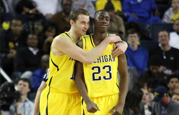 Nik Stauskas (11) and Caris LeVert (23)