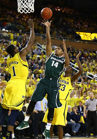 Glenn Robinson III (1) and Caris LeVert (23)