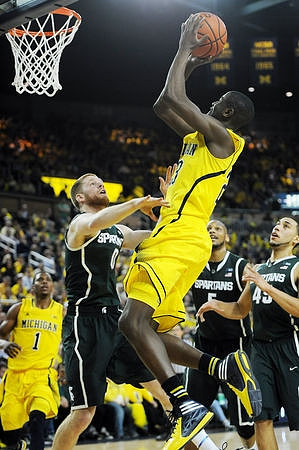 Glenn Robinson III (1) and Caris LeVert (23)