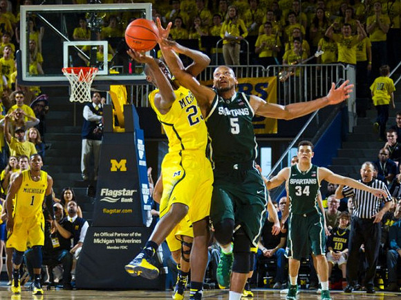 Glenn Robinson III (1) and Caris LeVert (23)