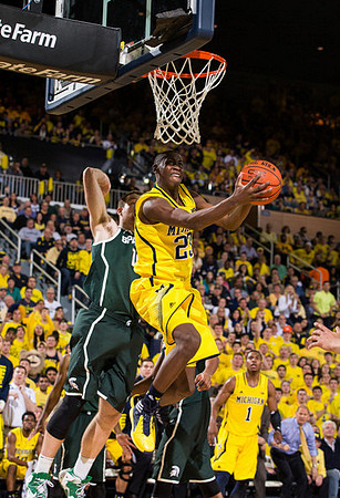 Caris LeVert (23) and Glenn Robinson III (1)