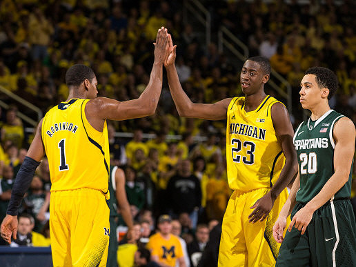 Glenn Robinson III (1) and Caris LeVert (23)