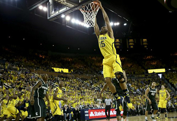 Glenn Robinson III (1), Jon Horford (15), and Nik Stauskas (11)