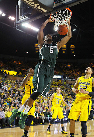Glenn Robinson III (1), Nik Stauskas (11), and Jordan Morgan (52)