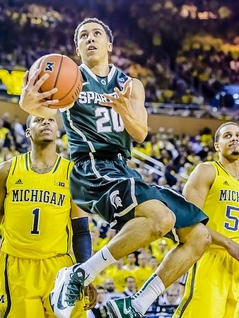 Glenn Robinson III (1) and Jordan Morgan (52)
