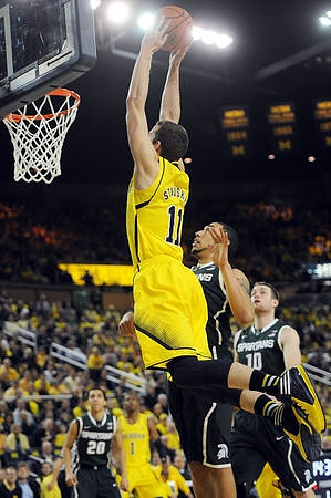 Nik Stauskas (11) and Glenn Robinson III (1)