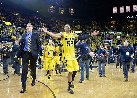 Mitch McGary (4), Spike Albrecht (2), Derrick Walton Jr. (10), and Jordan Morgan (52)