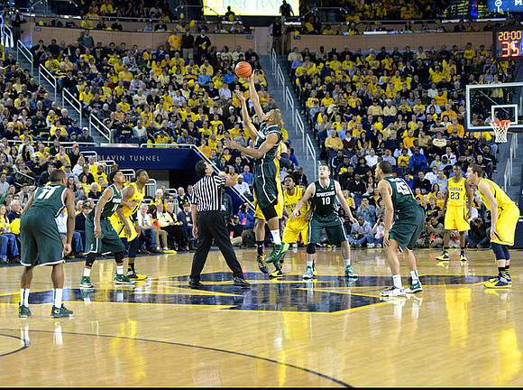 Glenn Robinson III (1), Derrick Walton Jr. (10), Caris LeVert (23), and Nik Stauskas (11)