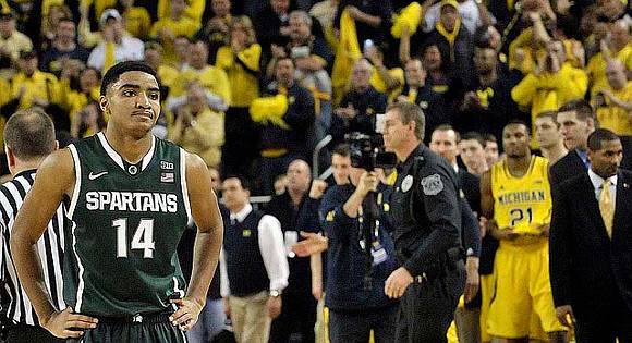 Zak Irvin (21) and LaVall Jordan