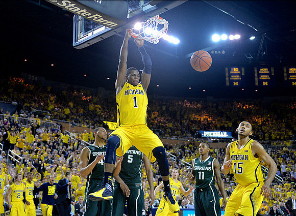 Glenn Robinson III (1), Nik Stauskas (11), and Jon Horford (15)