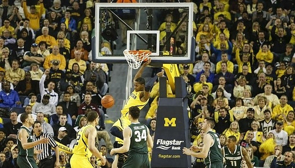Jordan Morgan (52) and Glenn Robinson III (1)