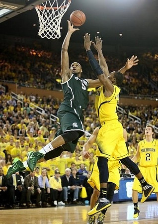 Glenn Robinson III (1) and Spike Albrecht (2)