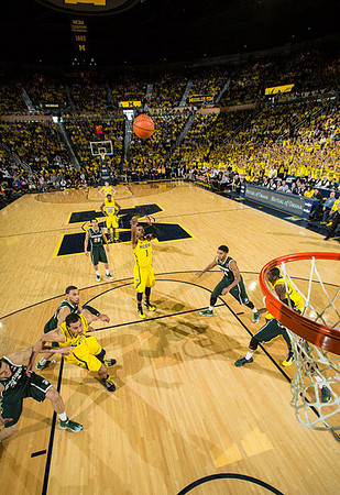 Jordan Morgan (52), Glenn Robinson III (1), and Derrick Walton Jr. (10)
