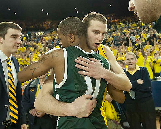 Cole McConnell (12) and Nik Stauskas (11)