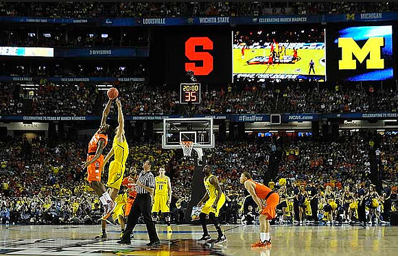 Mitch McGary (4), Nik Stauskas (11), and Tim Hardaway Jr. (10)