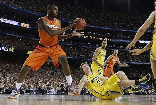 Spike Albrecht (2) and Trey Burke (3)