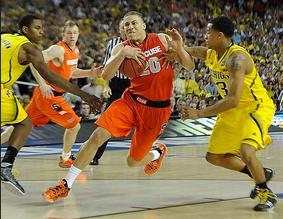 Glenn Robinson III (1) and Trey Burke (3)