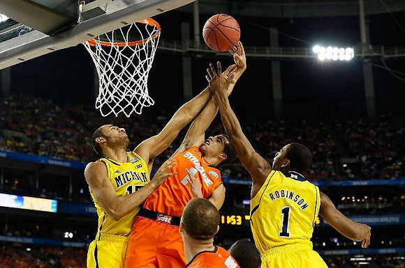 Jon Horford (15) and Glenn Robinson III (1)