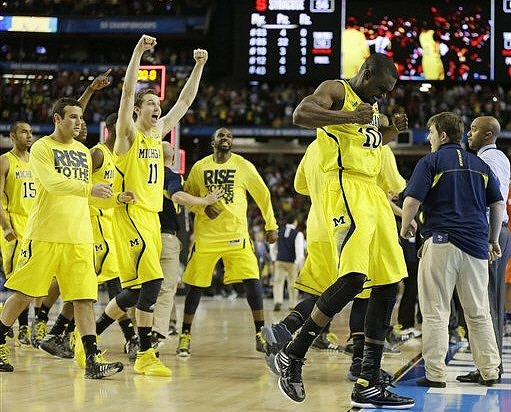 Jon Horford (15), Josh Bartelstein (20), Nik Stauskas (11), Corey Person (32), Tim Hardaway Jr. (10), and C.J. Lee