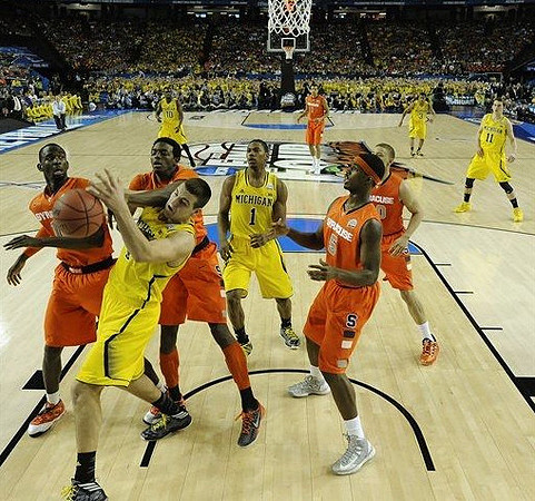 Mitch McGary (4), Glenn Robinson III (1), Tim Hardaway Jr. (10), Trey Burke (3), and Nik Stauskas (11)