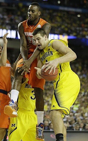 Trey Burke (3) and Mitch McGary (4)