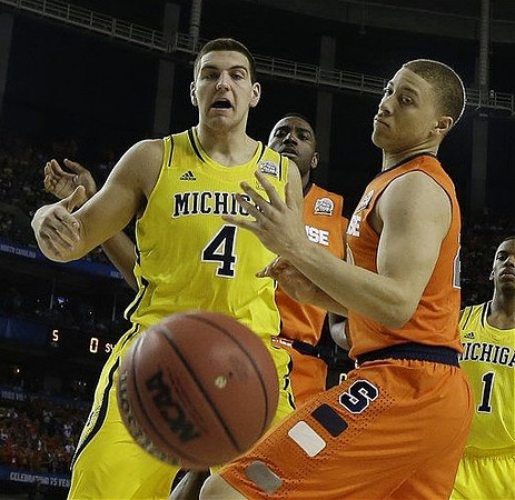 Mitch McGary (4) and Glenn Robinson III (1)