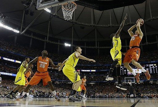Glenn Robinson III (1), Mitch McGary (4), and Tim Hardaway Jr. (10)