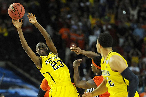 Caris LeVert (23) and Jordan Morgan (52)