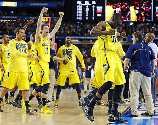 Jon Horford (15), Josh Bartelstein (20), Nik Stauskas (11), Corey Person (32), Tim Hardaway Jr. (10), and C.J. Lee