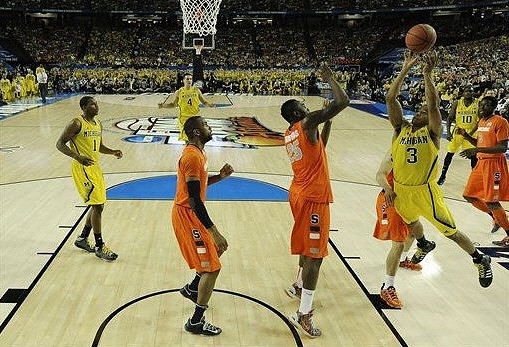 Glenn Robinson III (1), Mitch McGary (4), Trey Burke (3), and Tim Hardaway Jr. (10)