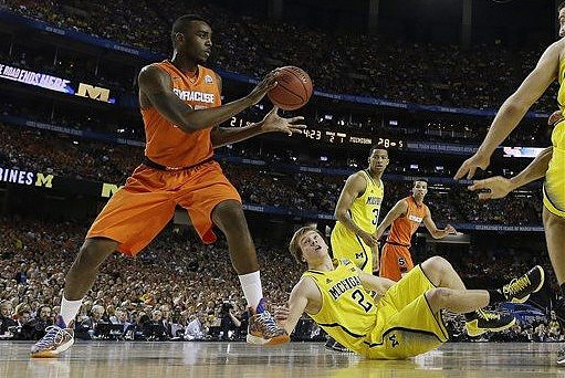 Spike Albrecht (2) and Trey Burke (3)